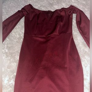 V cut, long sleeve, burgundy dress.
